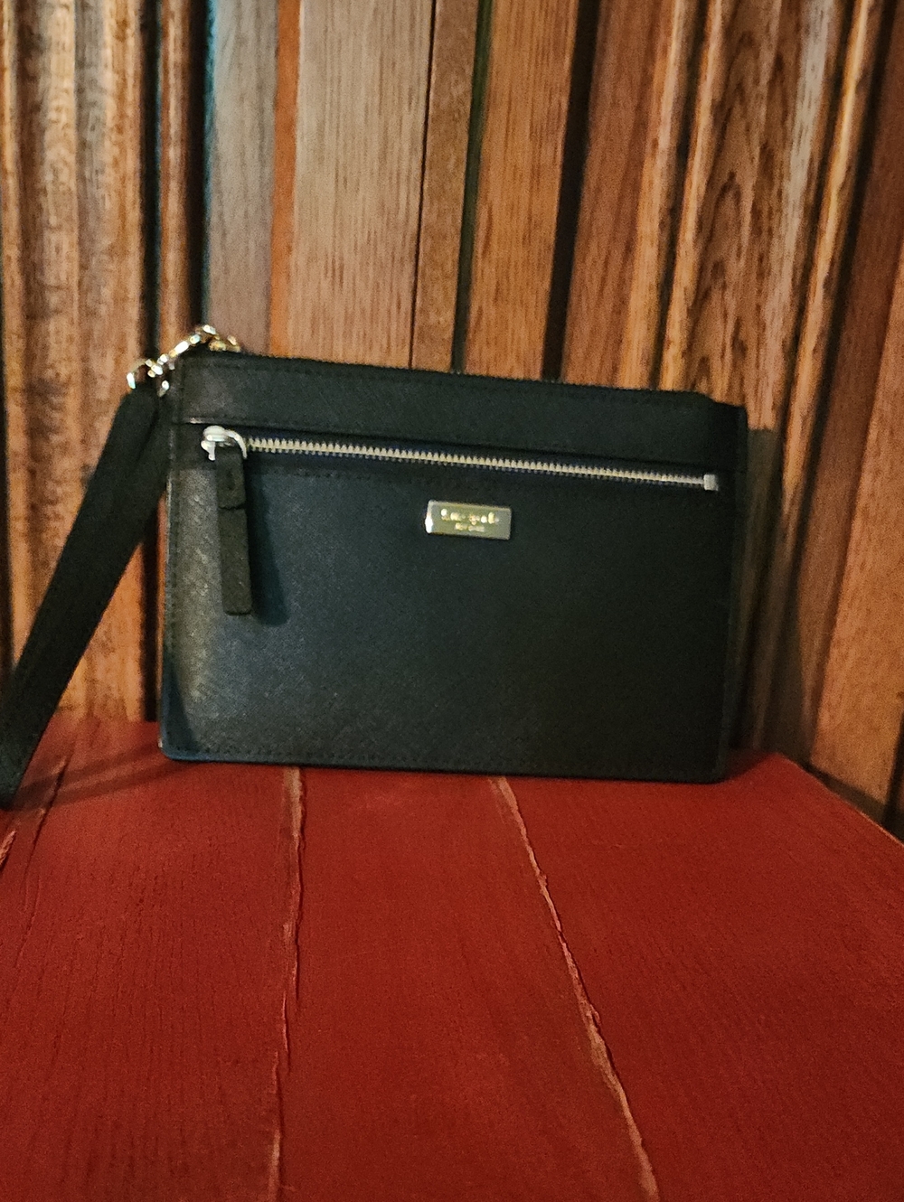 kate spade black leather wristlet crossbody with gold-tone logo